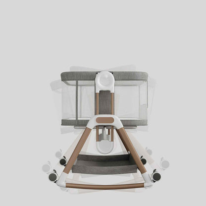 image du lit cododo bebe en mouvement a bascule de gauche a droite