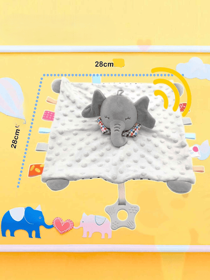 doudou éléphant sur un fond orange qui montre la forme carre et les dimensions avec tout les petits accessoires