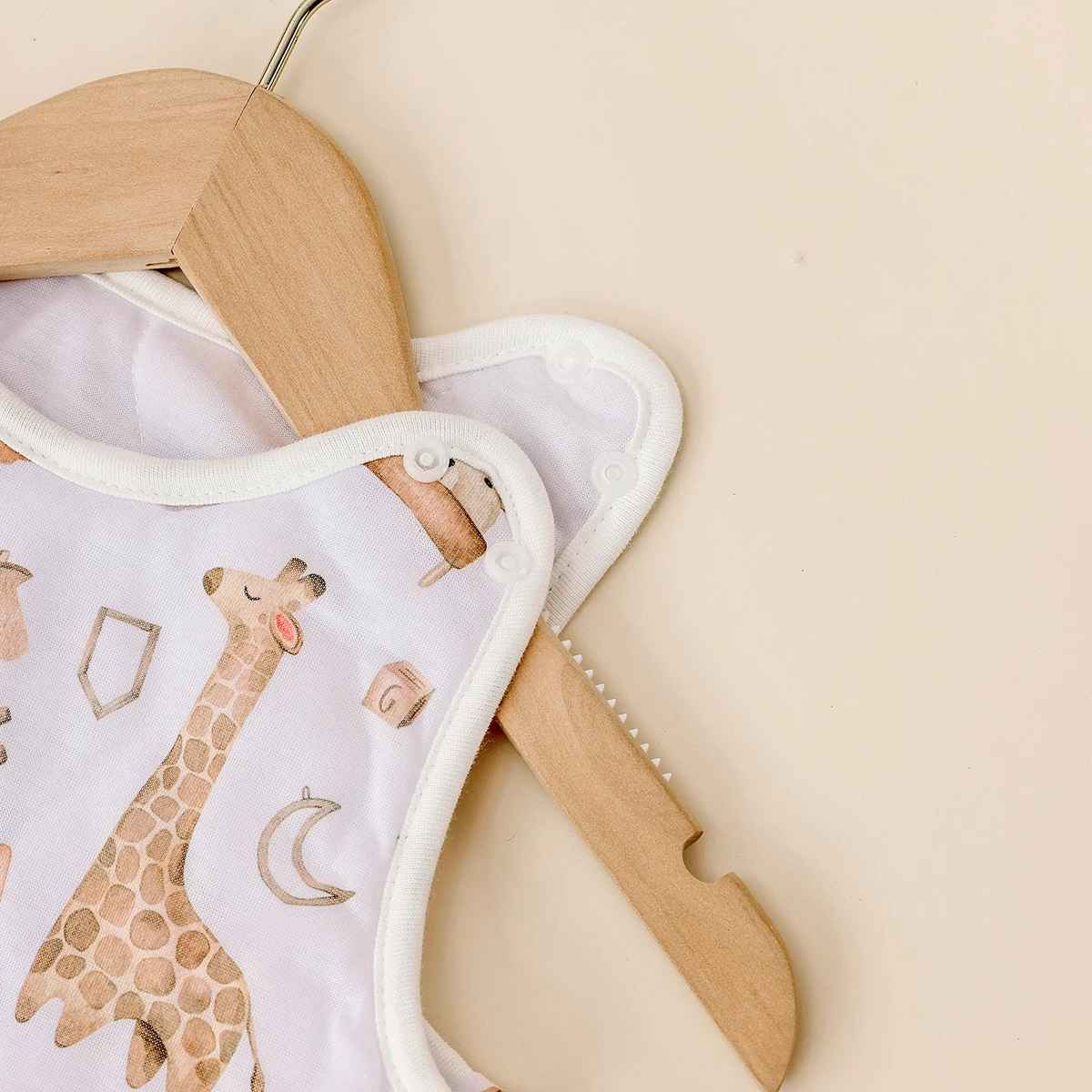 gigoteuse avec double boutons pression au niveau du haut des épaules