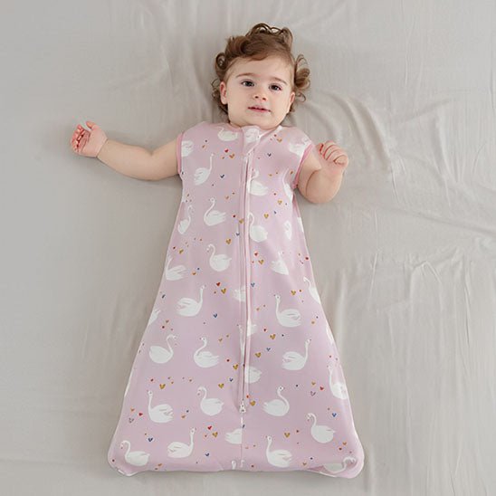 gigoteuse rose avec des cygnes sans manche tissu pour été