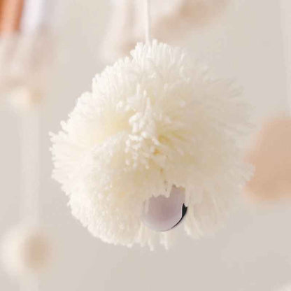 mobile bebe pour lit pompons blanc en laine