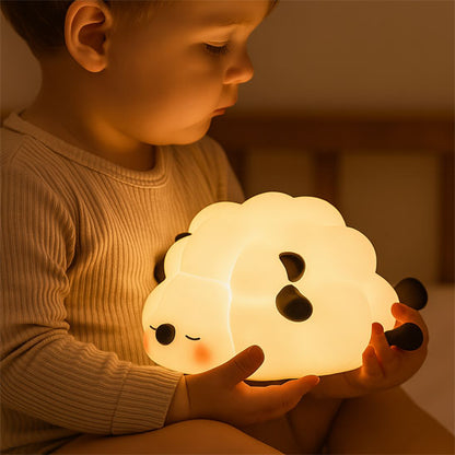 veilleuse bebe enfant tiens dans les  mains