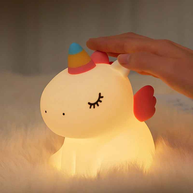 veilleuse bebe licorne la poser dessus pour allumer ou modifier les intensités de lumière 