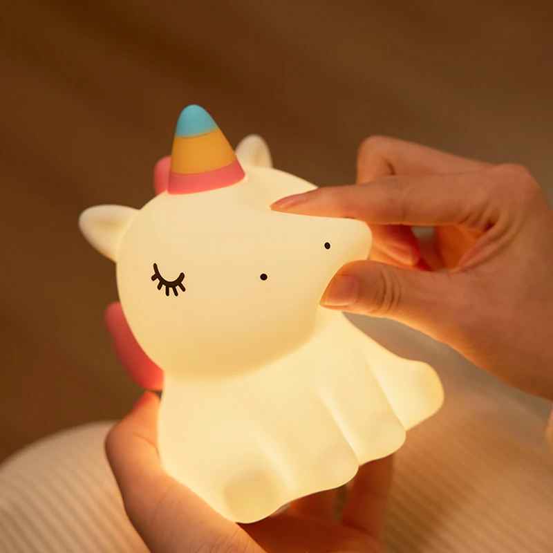 veilleuse bebe main qui pince la licorne silicone souple et douce