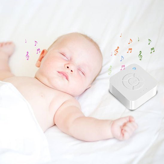 veilleuse bruit blanc bebe qui dort avec sa boite a musique avec des petite note de musique multicolores 
