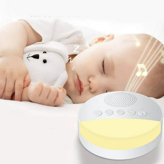 veilleuse bruit blanc bebe qui dort avec son doudou qui ecoute les doux son de la machine
