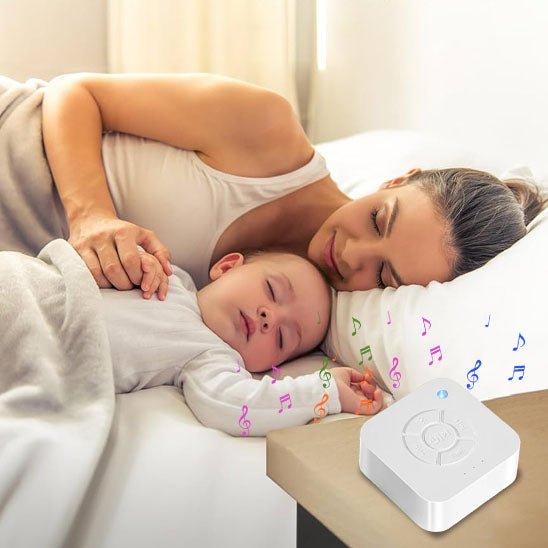 veilleuse bruit blanc maman et bebe qui dorme avec les doux sons de la nature sur la table de chevet